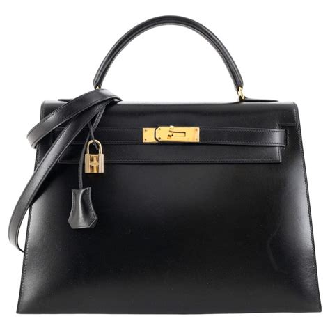 hermes kelly handbag noir box calf with gold hardware 32|hermes kelly retourne for sale.